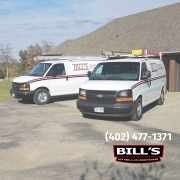 2 of Bill's Heating and Air Conditioning trucks.